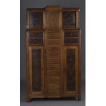 An early 20th century Continental Art Nouveau walnut and palmwood cabinet, in the manner of Louis