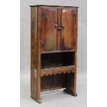 A 19th century Spanish elm side cupboard, fitted with two doors above an open shelf, height 177cm,