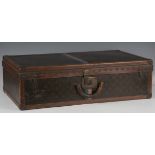 An early 20th century Louis Vuitton hard-sided travelling case with overall monogram and