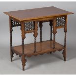 A late Victorian Anglo Moorish walnut rectangular occasional table, probably by Liberty & Co, the