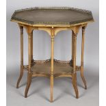 An Edwardian mahogany octagonal centre table, inspired by an E.W. Godwin design, the gilt brass