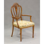 An Edwardian Irish satinwood pierced splat back elbow chair with inlaid decoration, the