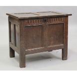 A late 17th century oak panelled coffer with stop fluted frieze above double panel front, on stile