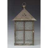 A late 19th/early 20th century Arts and Crafts brass framed ceiling hall lantern of large