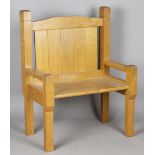 A mid-20th century Arts and Crafts style oak hall seat of large proportions, possibly Cotswold