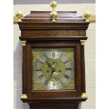 A George II oak longcase clock with eight day movement striking on a bell, the 12-inch square