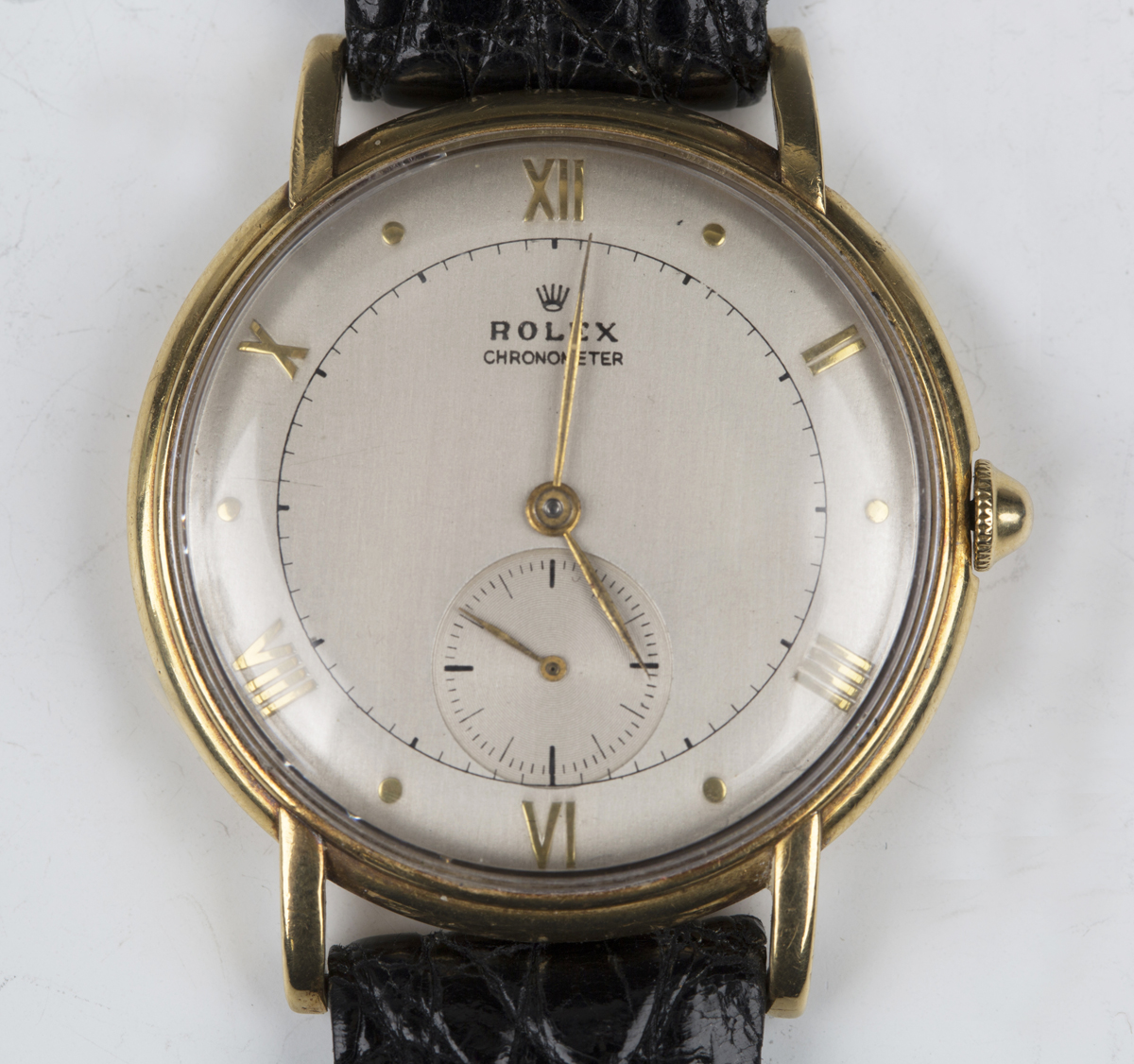 A Rolex Chronometer 18ct gold circular cased gentleman's wristwatch, the signed silvered dial with