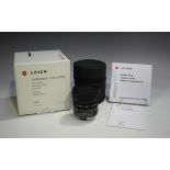 A Leica Summicron-M 1:2/35 ASPH lens, No. 3906935, circa 2000, with black anodized finish, boxed,