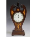 An Edwardian mahogany and boxwood inlaid mantel timepiece with eight day movement, the circular