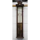 A late Victorian oak cased Admiral Fitzroy's barometer with printed paper dial, the rectangular case