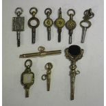 A group of four mostly Victorian watch keys, including a twin sided bloodstone and paste imitating