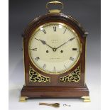 A George III mahogany bracket clock with eight day twin fusee movement striking hours on a bell, the