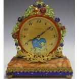 An early 20th century gilt metal and enamelled boudoir timepiece, the case back with stamped '
