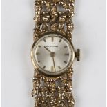 A Favre-Leuba 9ct gold lady's bracelet wristwatch, the signed silvered dial with gilt baton hour