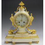 A late 19th century French ormolu and white onyx mantel clock with eight day movement striking on