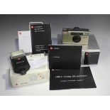 A Leica Minilux DB Exclusive camera, No. 2161336, circa 1995, with Summarit 1:2.4/40mm lens,
