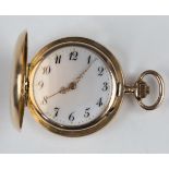A 14ct gold keyless wind hunting cased lady's fob watch, the enamelled dial with black Arabic hour