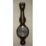 A George III mahogany wheel barometer of large proportions, with silvered dial, inscribed 'I