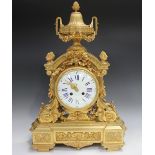 A late 19th century French ormolu cased mantel clock with eight day movement striking on a bell, the