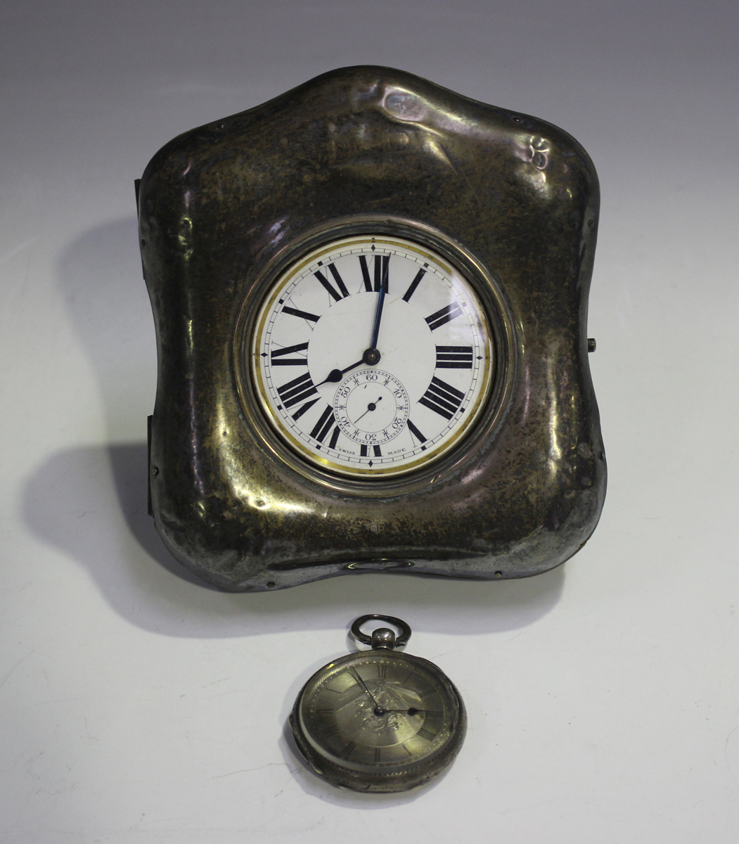 A base metal cased keyless wind open-faced Goliath pocket watch, the enamelled dial with black Roman