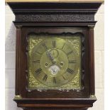 A mid-18th century oak longcase clock with eight day movement striking on a bell, the 11-inch square