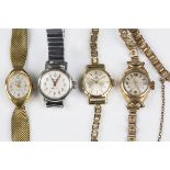 A Tissot gilt metal fronted and steel backed lady's wristwatch, fitted to a 9ct gold bracelet with a