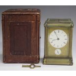 A late 19th century French brass gorge cased carriage alarm clock, retailed by J. Klaftenberger,