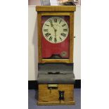 A George V British Time Recorder Co Ltd oak clocking-in clock with eight day movement and signed