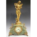 A late 19th century French green onyx and gilt metal mantel clock with eight day movement chiming on