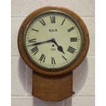 A George V South Eastern Railway oak cased drop dial wall timepiece with eight day chain driven