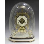 A late Victorian brass skeleton clock with eight day single fusee movement striking hours on a bell,