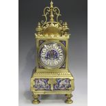 A late 19th century French brass and enamelled porcelain mounted mantel clock with eight day