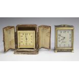 A Zenith gilt metal cased bedside alarm clock with eight day movement, the silvered rectangular dial