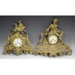 A group of four late 19th century French gilt spelter mantel clocks, each with eight day bell strike