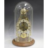 A 20th century brass skeleton clock with chain driven single fusee movement striking hours on a