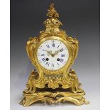 A 19th century French ormolu mantel clock with eight day movement striking hours and half hours on a