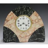 An Art Deco French marble cased mantel clock with eight day movement striking on a bell via an