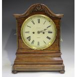 A Victorian rosewood bracket clock with eight day twin fusee movement striking on a bell with pull