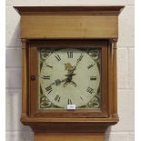 A 19th century pine longcase clock with thirty hour movement striking on a bell via an outside