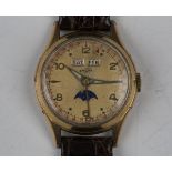 An Enicar gilt metal fronted and steel back triple calendar gentleman's wristwatch with signed