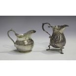 A late 19th/early 20th century Chinese silver cream jug of baluster form with scroll handle, Hong