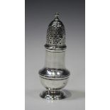A George II silver baluster pepper caster with pierced domed cover, on a circular foot, London