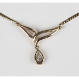A 9ct gold and diamond pendant necklace, the front in an openwork design terminating as a diamond