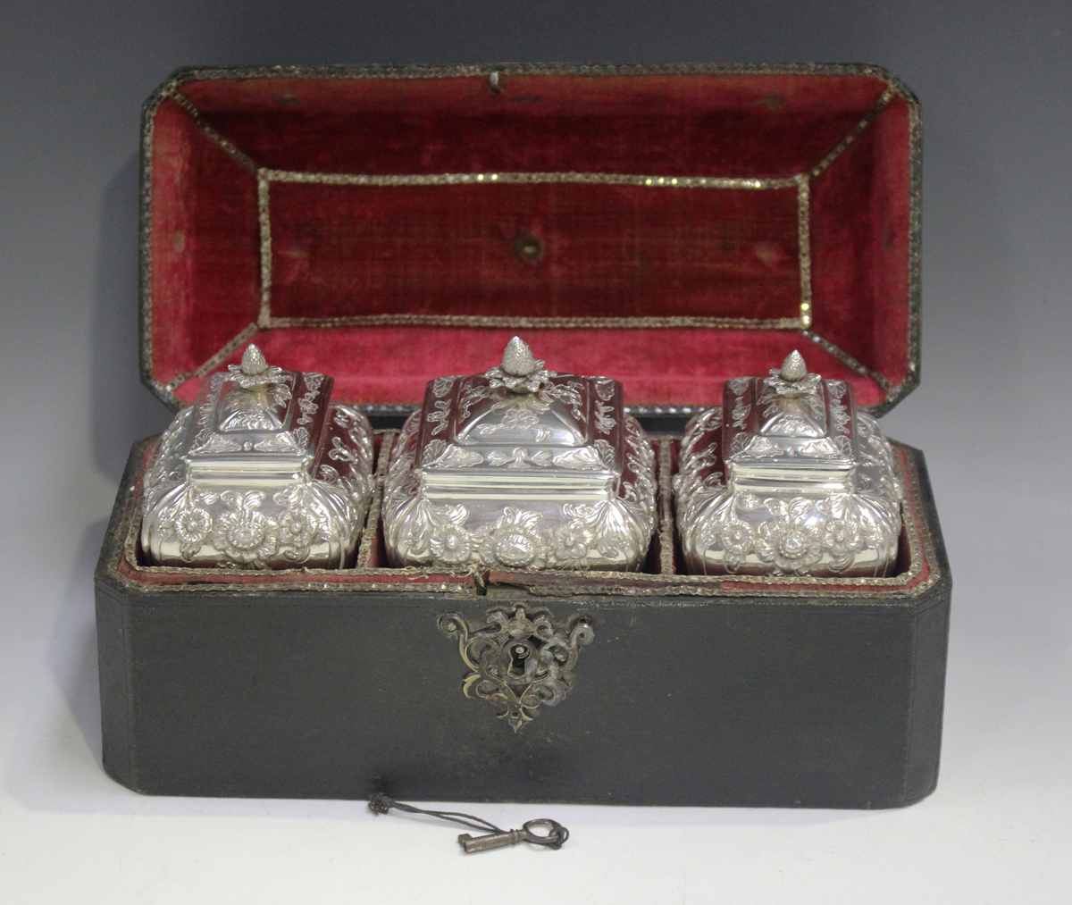 A set of three George III silver graduated tea caddies and covers with strawberry finials, each of - Image 5 of 30