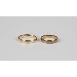 An 18ct gold wedding ring, Birmingham 1931, ring size approx Q1/2, weight 4.4g, and another 18ct