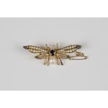 A gold, sapphire and seed pearl brooch, circa 1910, designed as a winged insect, mounted with the