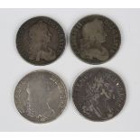 A group of four British coins, comprising three Charles II crowns, 1662, 1664 and 1673, and a