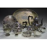 A collection of plated items, including a four-piece tea set, an oval galleried tea tray, a card