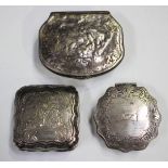 A 19th century Dutch silver snuff box of shaped square form, the hinged lid engraved with flowers,