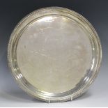 An Elizabeth II silver circular salver with raised reeded rim, Sheffield 1950 by Walker & Hall,